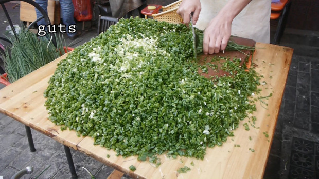 Street Food Kína utcai árus élelmiszer tészta táska zöldhagyma