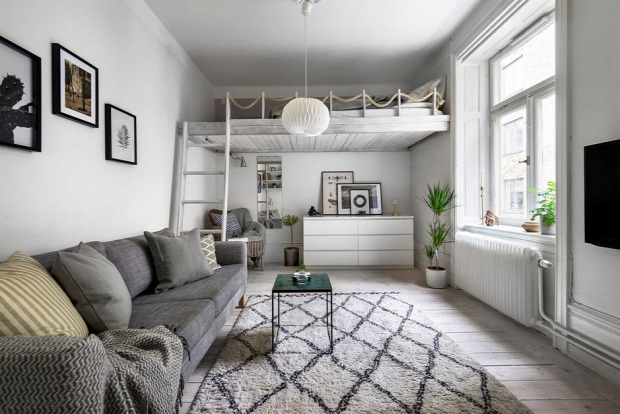 kis lakás garzon helykihasználás praktikus kialakítás skandináv stílus szürke falak