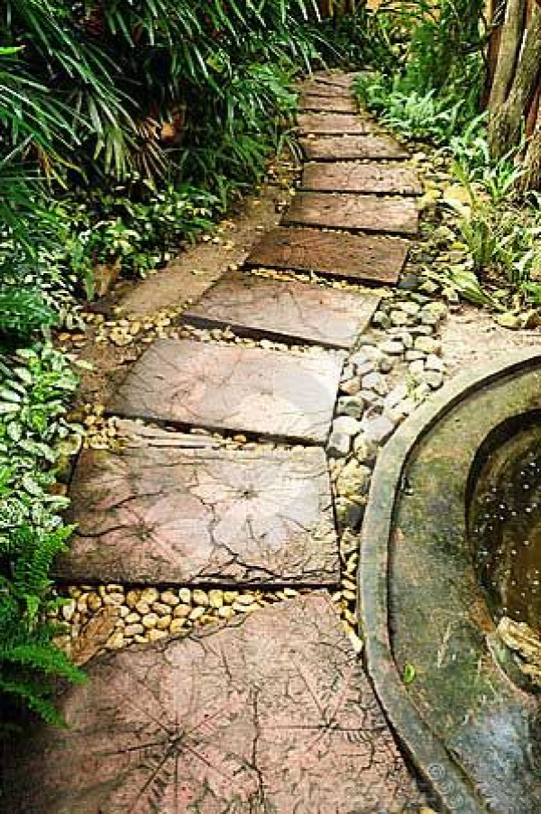 DIY pathway leaf pavers... -- Gotta love that reddish color too, as opposed to gray concrete.