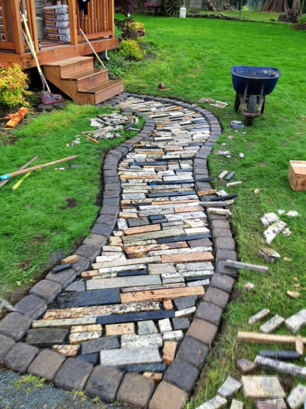 Granite scraps used to form a walkway - add grout and you're done.