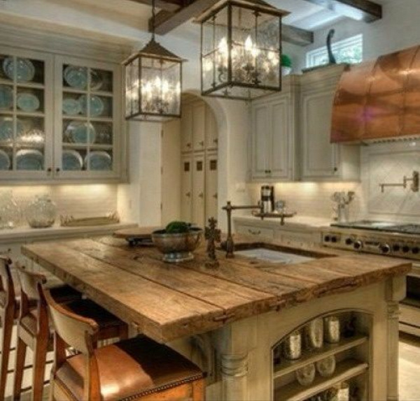 Love the rustic kitchen island, would change the wall colors to turquoise and black with stainless steel accents