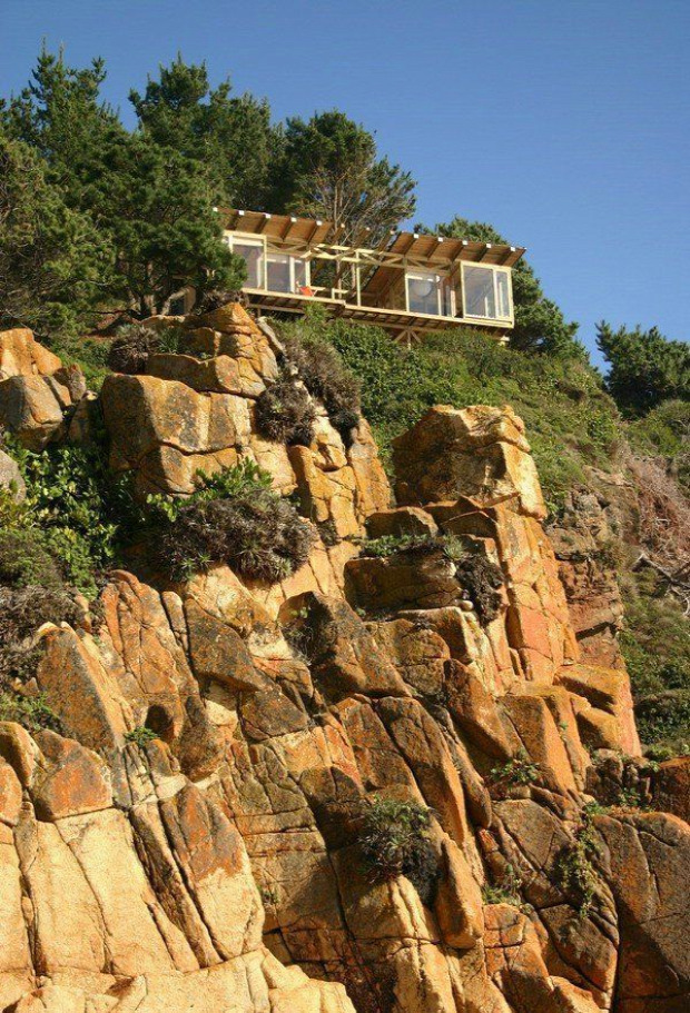 A világ érdekes ház tenger sziklafal