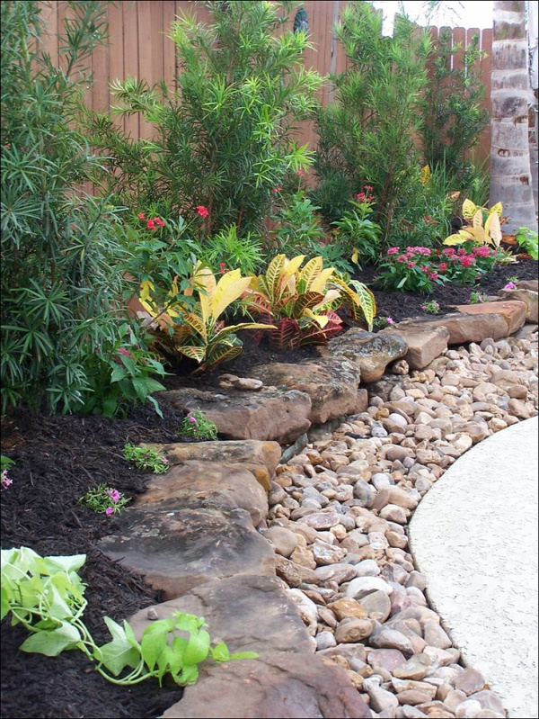 Layered rock border ~ This really looks attractive as a border for a flowerbed.