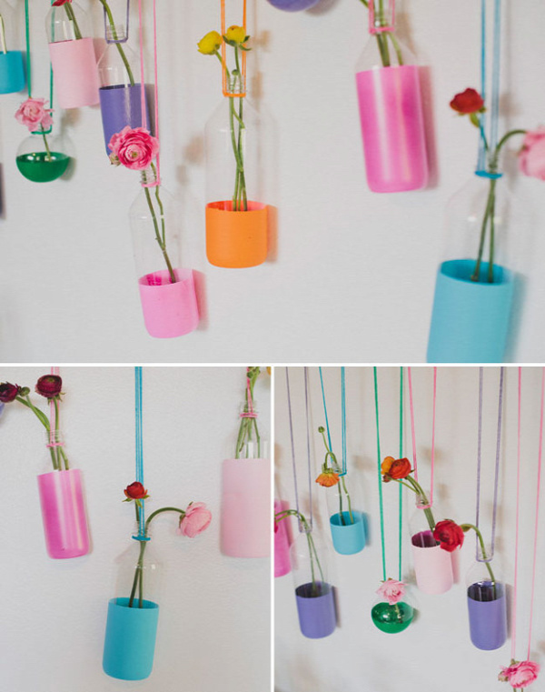 These pretty vases are just spray-painted bottles.