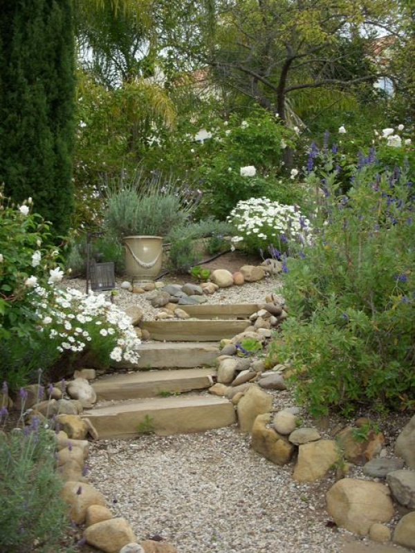 xx..tracy porter..poetic wanderlust...-pea gravel- path to a secret garden. with river rock and gravel