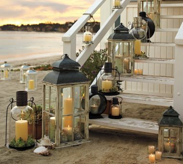 Gary and Elaine watched in awe as the lanterns performed their annual ritual of emerging from the sea and making their way up the back steps.