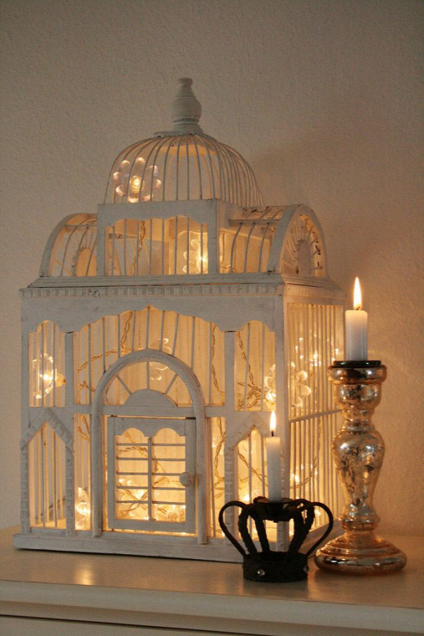 Bird Cage decorated with Christmas lights. The prettiest idea for a birdcage that I've seen to date. (no source as I found this on one blog after another that did not source the origin)