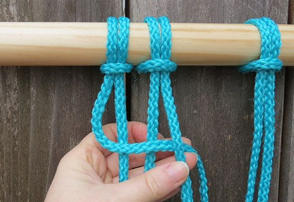 Four cords are used to create a square knot.