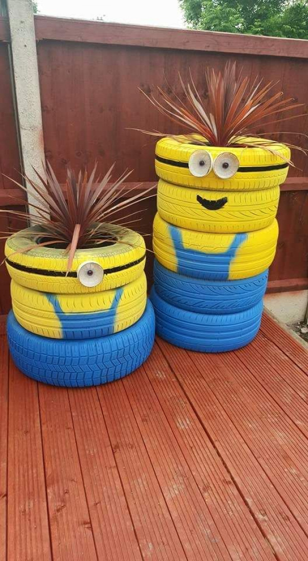 Minion planters made from old tires.